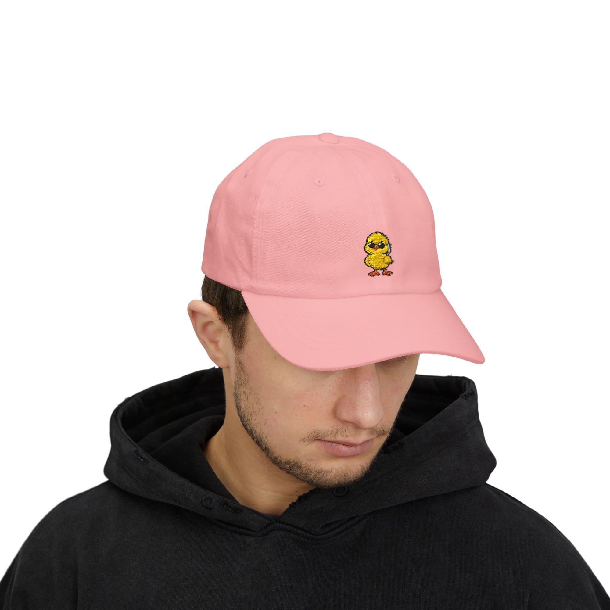 The Embroidered Duck Cap in pink, worn